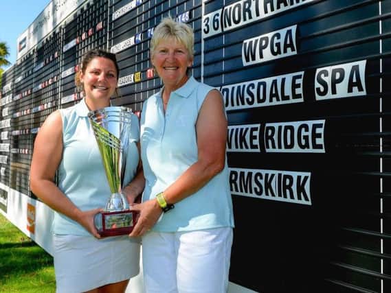 WPGA Lombard Trophy winners Nikki Dunn, left, and Sue Kiddle (Picture: Tony Marshall/Getty Images).