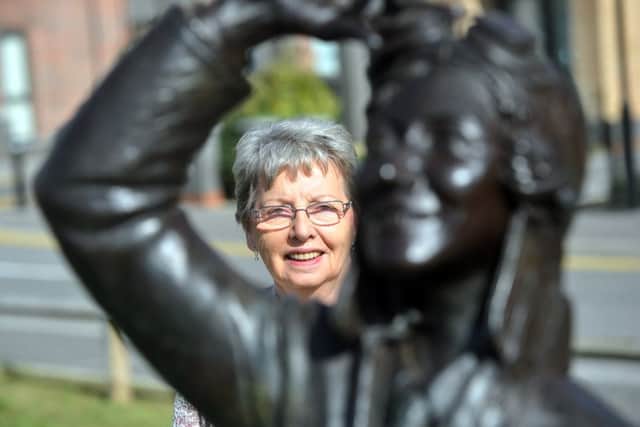Judy Chilvers, neice of  Amy Johnson, by the bronze statue