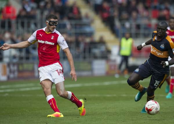Rotherham United's Dominic Ball is challenged by Newcastle United's Mohamed Diame (Picture: Jon Buckle/PA Wire).