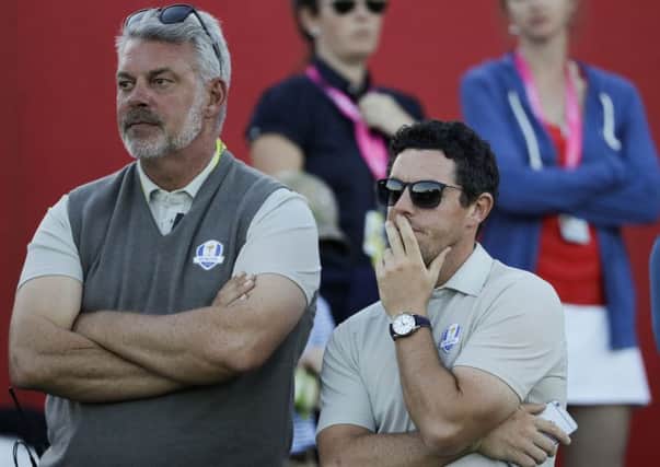 Not amused: Europe captain Darren Clarke and Rory McIlroy.
Picture: AP Photo/David J. Phillip
