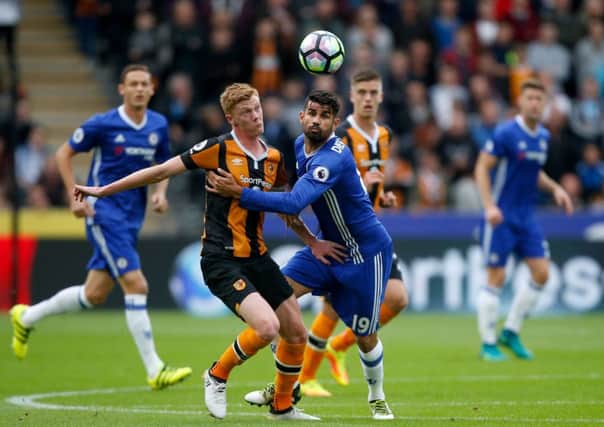 Hull City's Sam Clucas and Chelsea's Diego Costa battle for the ball (Picture: Danny Lawson/PA Wire).
