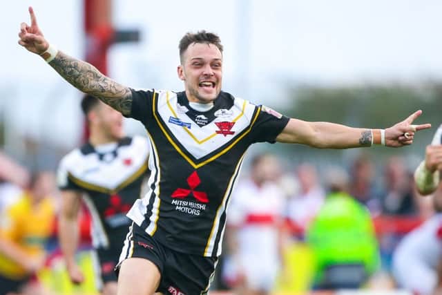 Salford's Gareth O'Brien celebrates scoring the golden point to win the game and avoid relegation.