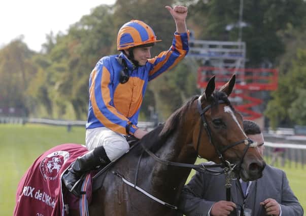 Jockey Ryan Moore shows his delight after Founds victory in the Qatar Prix de lArc de Triomphe (Picture: Michel Euler/AP).