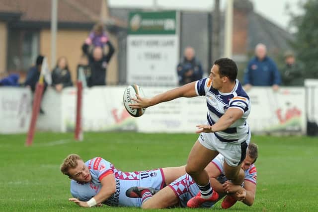 Yorkshire Carnegie's Peter Lucock offloads in Saturday's victory over Yorkshire Championship rivals, Rotherham Titans. Picture: Scott Merrylees.