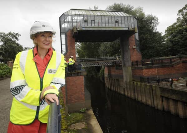 Environment Secretary Andrea leadsom inspects the Foss Barrier in York.