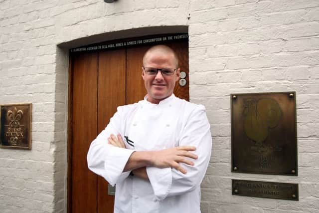 Heston Blumenthal outside his Fat Duck restaurant in Bray, Berkshire, which regained its three Michelin stars to rejoin the elite club of world eateries.   Pic: Steve Parsons/PA Wire
