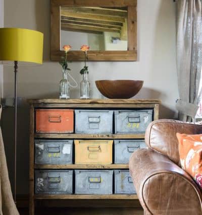 Glenys loved the industrial look of the colourful tin-drawer unit.