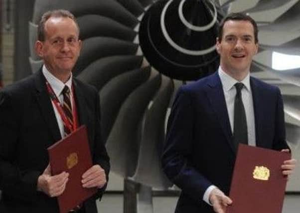 Sir Steve Houghton and then chancellor George Osborne at the signing of the draft deal last year