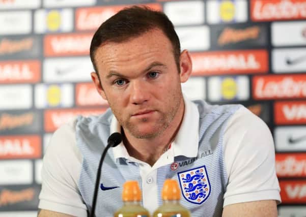 READY FOR THE BATTLE: England captain Wayne Rooney says he is determined to fight to regain his place in Manchester Uniteds starting line-up. Picture: mike egerton/PA