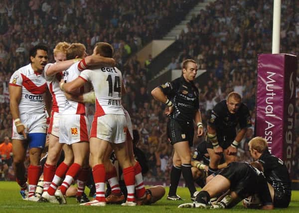 TEN YEARS ON: St Helens celebrate their final try against Hull FC in the 2006 Grand Final at Old Trafford.  Picture: Bruce Rollinson.