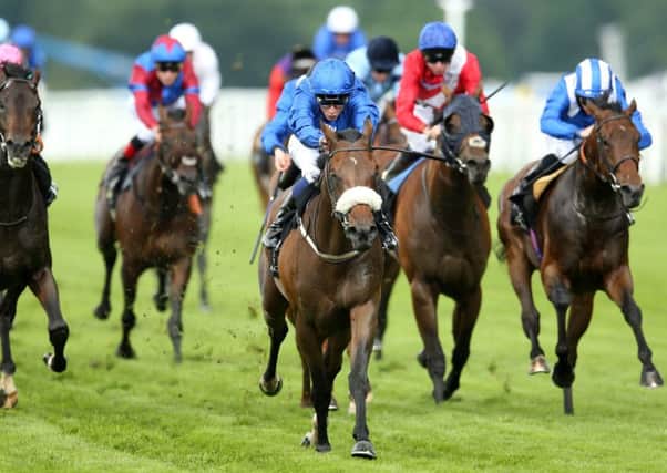 Ribchester ridden by William Buick (centre).