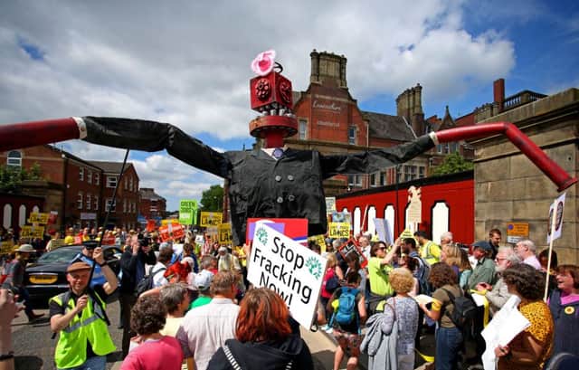 Protestors against fracking gathering outside Preston County Hall. The Government has given the go-ahead for fracking at a site in Lancashire, overturning the county council's decision on the scheme. Peter Byrne/PA Wire
