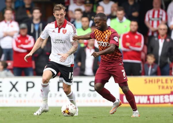 Mark Marshall, right, in action for Bradford City against Sheffield United last season. Picture: Philip Oldham/SportImage.