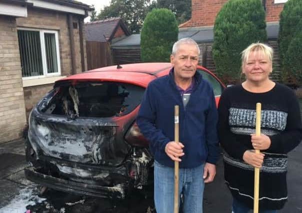 Steve and Susan Booth had their car destroyed in an arson attack