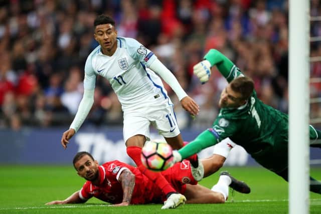 England's Jesse Lingard has his header saved by Malta goalkeeper Andrew Hogg during the 2018 FIFA World Cup Qualifying match at Wembley Stadium, London. (Picture: PA)