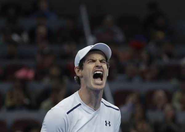 Andy Murray celebrates after winning a point against Grigor Dimitrov during the men's final of the China Open. Picture: AP/Andy Wong