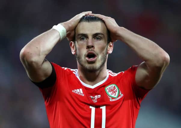 Wales' Gareth Bale reacts after coming close to scoring a second goal during the FIFA 2018 World Cup qualifying, group D match at the Cardiff City Stadium, Cardiff. (Picture: PA)