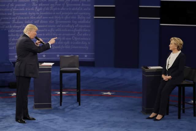 Donald Trump and Hillary Clinton slug it out at the second presidential debate at Washington University in St. Louis
