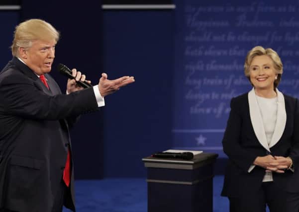 Donald Trump and Hillary Clinton slug it out at the second presidential debate at Washington University in St. Louis