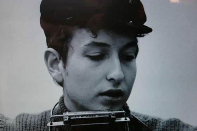 Bob Dylan questioned the value of money when compared with happiness.