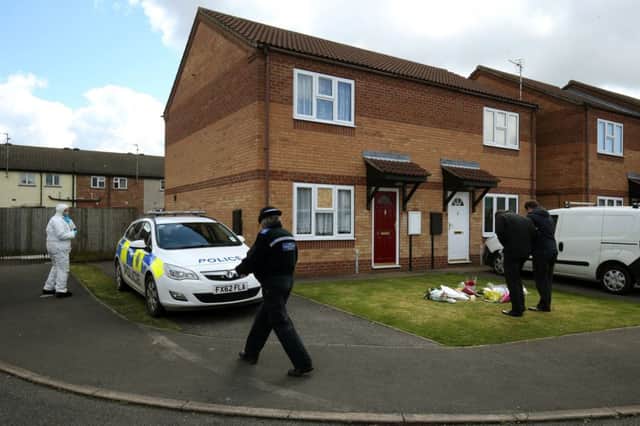 The scene outside a house in Spalding, Lincolnshire, where the bodies of 49-year-old Elizabeth Edwards and 13-year-old Katie were found