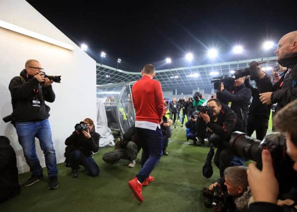 England's Wayne Rooney arrives for the walkaround at Stadion Stozice, Ljubliana.
