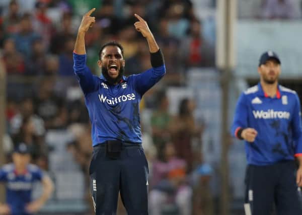 England's Adil Rashid, centre, reacts after a delivery during the third one-day international cricket match against Bangladesh in Chittagong, Bangladesh. (AP Photo/A.M. Ahad)