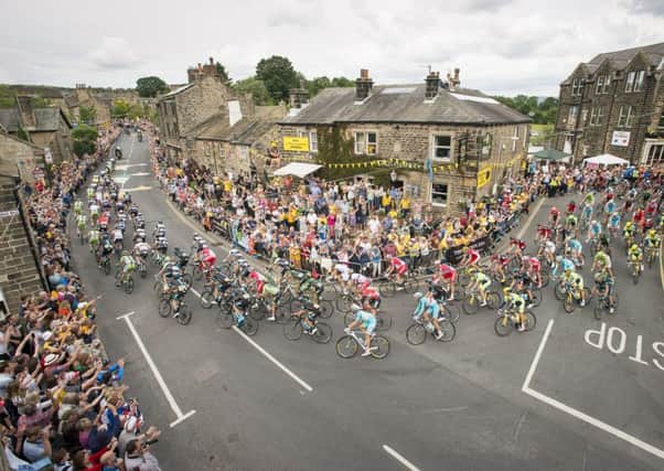 Tour de France 2014 - Stage 2, York to Sheffield - Yorkshire, England - The peloton Passes through Addingham for the second time in Le Tour. (Picture: SWPix.com)