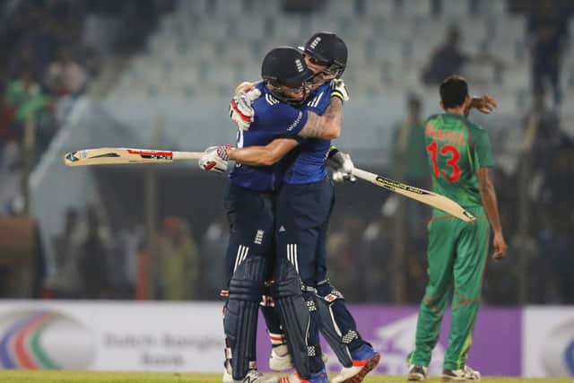 England's Ben Stokes, left, and Chris Woakes celebrate their series victory in Chittagong. Picture: AP/AM Ahad