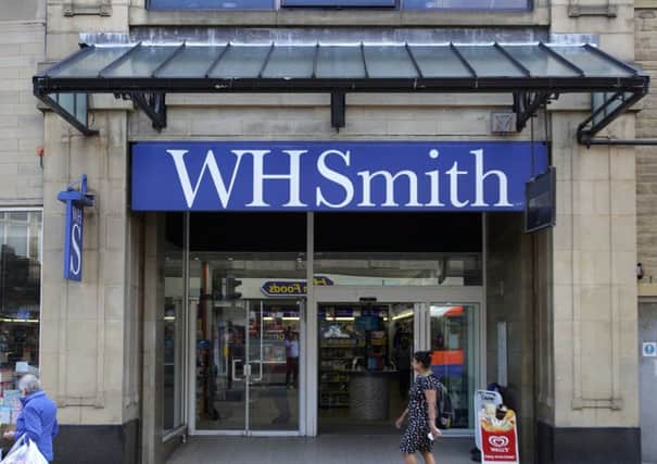 WH Smith looks to curb costs