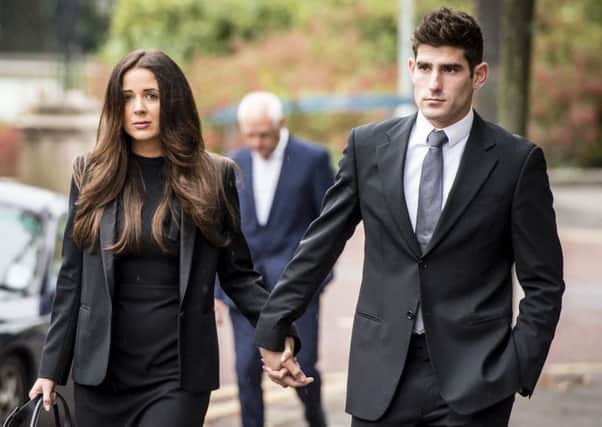 Ched Evans at Cardiff Crown Court with partner Natasha Massey