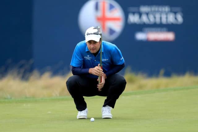 England's Richard Bland lines up a putt during day two of the British Masters at The Grove. Picture: Adam Davy/PA.