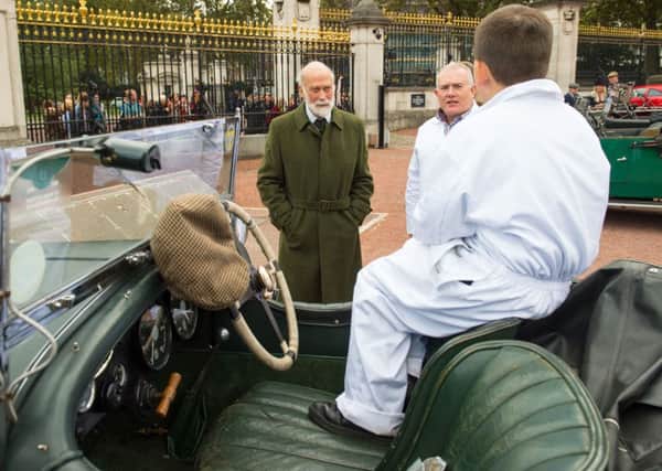 Prince Michael of Kent (left) views a 1929 Bentley Le Mans, part of a display of 90 historic British-built motor vehicles in the forecourt of Buckingham Palace. Dominic Lipinski/PA Wire