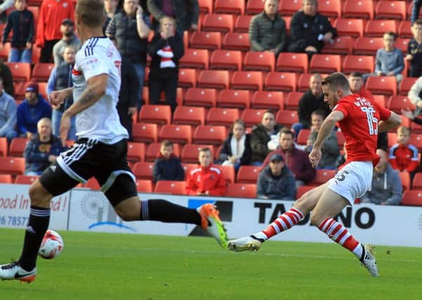 Marley Watkins scores for Barnsley against Fulham. Picture: Chris Etchells