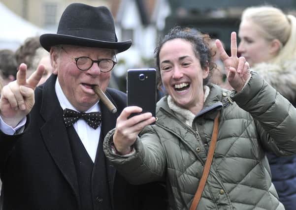 Sir Winston Churchill  (Peter Austwick) has a selfie with a delighted Melanie Challenger. PIC: Richard Ponter