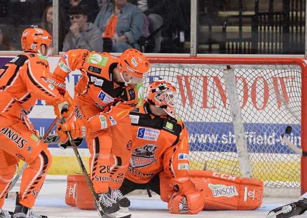 Sean Bentivoglio slots home his second of the night for Cardiff Devils against Sheffield Steelers. Picture: Dean Woolley.