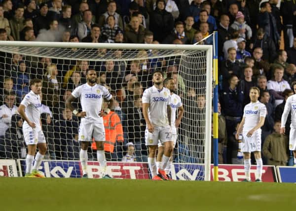 Leeds United's players show their dejection after conceding a latte equaliser.  Picture: Bruce Rollinson.