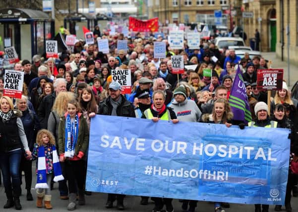 Protesters take to the streets to show their support for Huddersfield Royal Infirmary's A&E unit.