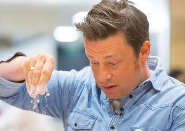 Jamie Oliver, seen here teaching to children in London last month, visited Harrogate this week. (PA).
