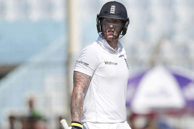 England's Ben Stokes looks back as he walks back to the pavilion after his dismissal by Bangladesh's Shakib Al Hasan  (AP Photo/A.M. Ahad)