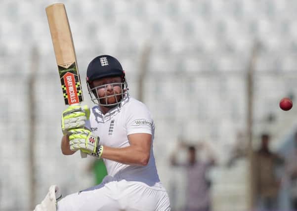 England's Jonny Bairstow plays a shot during the first day of their first cricket test match against Bangladesh in Chittagong, (AP Photo/A.M. Ahad)