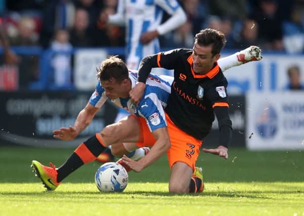 Contrasting weeks for Huddersfield Town and Sheffield Wednesday (Photo: PA)