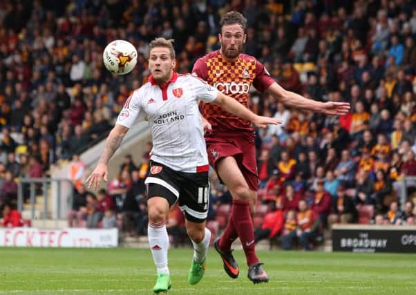 Rory McArdle in action for Bradford City against Sheffield United last season (Picture: SportImage)