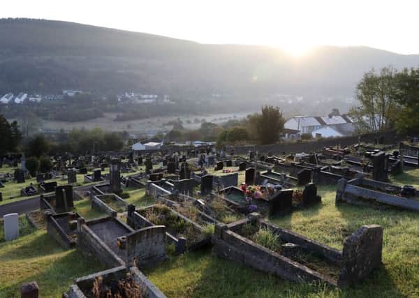 The graves of the victims of the Aberfan disaster in the village's cemetery in Wales, on the 50th anniversary of the tragedy.