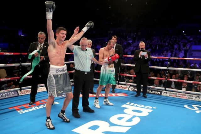 Luke Campbell celebrates victory over Derry Matthews for the WBC Silver Lightweight Championship at the Echo Arena. (Picture: Peter Byrne/PA Wire)