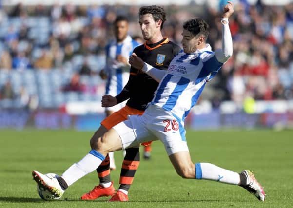 Huddersfield Town record signing Chris Schindler closes down Sheffield Wednesdays Kieran Lee in Saturdays derby. (Picture: Steve Ellis)