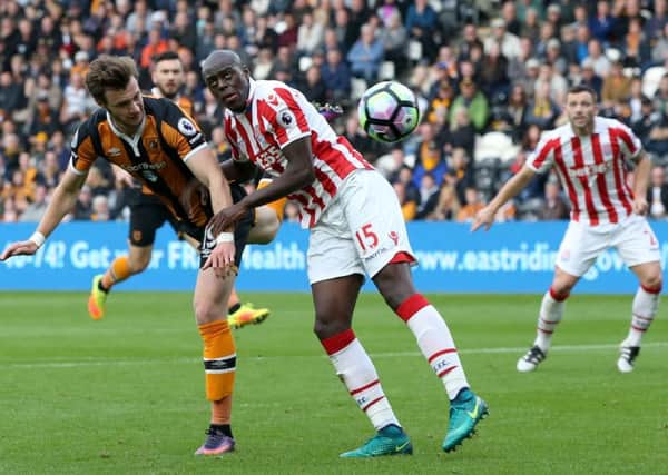 Hull City's Will Keane and Stoke City's Bruno Martins Indi battle for the ball during the Premier League match at the KCOM Stadium, Hull. (Photo: PA)