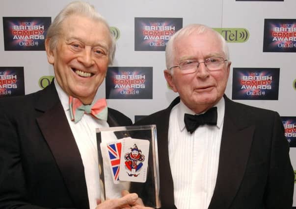File photo dated 10/12/2003 of comedy writers Jimmy Perry (left) and David Croft with their lifetime achievement award during for the annual British Comedy Awards. Croft, who wrote hit sitcoms including Dad's Army and Are You Being Served? died today aged 89, his agent said. PRESS ASSOCIATION Photo. Issue date: Tuesday September 27, 2011. See PA story DEATH Croft. Photo credit should read: Ian West/PA Wire