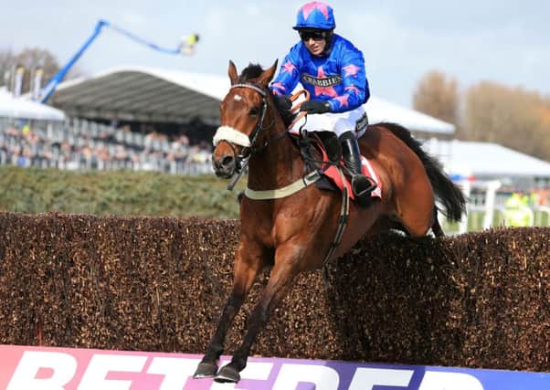 Cue Card ridden by jockey Paddy Brennan (Picture: PA)