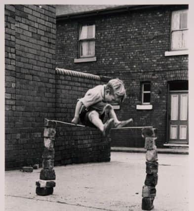 High Jump by Jack Hulmes which features in a new exhibition of street photography at Sheffield's Graves Gallery.